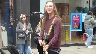 "WONDERFUL WORLD"  BY RYAN O'NEIL, SOLO BUSKING IN MARKET ST. MANCHESTER   01/04/2023