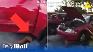 Florida police save man from being trapped to death under his car after jack fails during repairs