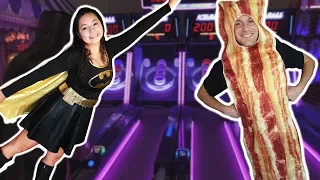 Batgirl and Mr. Bacon at the Arcade for Halloween!