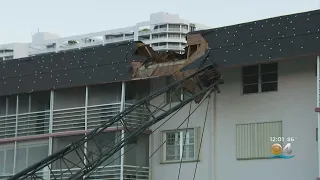 Crane Falls, Damages Condo in North Miami Beach