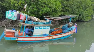 Thai fishing boat in the mangrove forest fishing village of Salakphet, Koh Chang