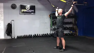 How to Perform The TRX Wall slides