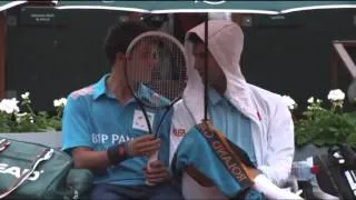 Novak Djokovic Sharing a drink with a ballboy