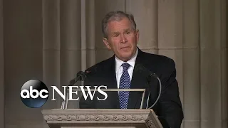 George W. Bush eulogizes his father through tears, laughter