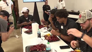 WATCH NOW: Saints rookies try to tackle crawfish for the first time