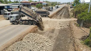 Special Work Expand Additional Road Build by Team Operator Dump Truck and Bulldozer Pushing Stone