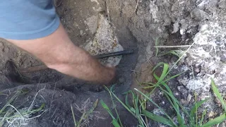 Repairing rusted through underground cast iron supply water pipe.