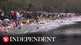 Hundreds take plunge for chilly Christmas Day swim