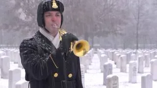 "Taps" performed by United States Army Band Bugler in Arlington National Cemetery in snow.