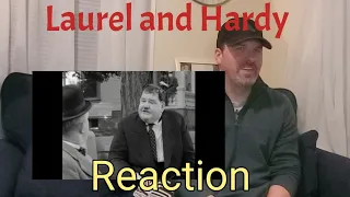 Reaction - Laurel and  Hardy Why didn't you tell me you had 2 legs