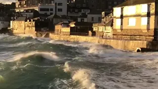 St Ives Sunrise in February 2019. Storm serge. High Waves.