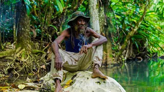 Rastaman Builds Fire By the River