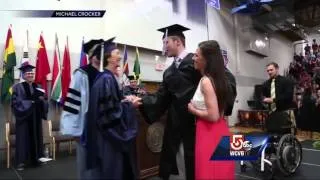 Must see video: Once-paralyzed student walks at graduation