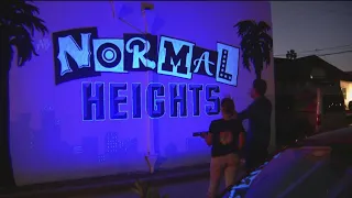 Glow in the dark invisible paint mural lights up the night in Normal Heights