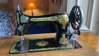 Operation of a singer 27 or 28 treadle.
