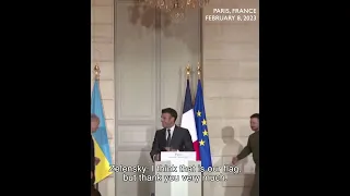 Zelensky tells Scholz that he is standing in front of the Ukrainian flag, Macron laughing