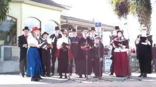 Church Choir singing Christmas Carols welcoming Santa Claus