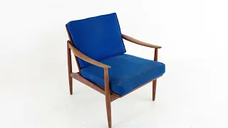 Mid Century Danish Teak and Cane Lounge Chair