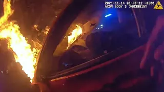 Video shows intense moment where Atlanta officers rush to rescue man from burning car after crash