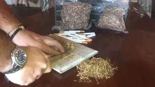 Cutting Tobacco with a Knife and Cutting Board