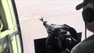 Door Gunner on Iraqi Mi 17 shreds ISIS vehicle