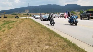 Group of riders coming thru Sturgis with an escort 8/8/17