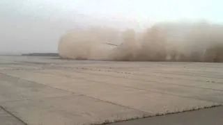 BLACKHAWK KICKING UP A LOT OF DUST in Iraq