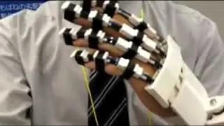 A hand exoskeleton robot for rehabilitation using a three-layered sliding spring mechanism