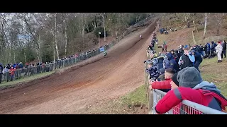 Glenn coldenhoff and romain febvre (wheelieing) up hawkstone Park motocross international.