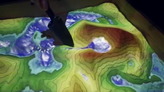 Augmented-Reality Sandbox to Boost Education & Outreach