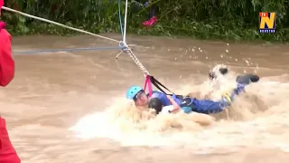 Rains hit several parts of China, causing floods and trapping residents