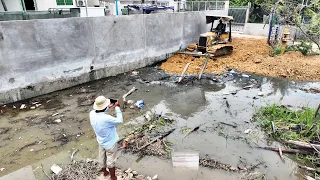 100% Connected Small Road Sarrounding School With Small Machinery. Mitsubishi Bulldozer And 5T Truck