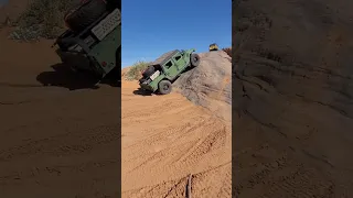 Humvee climbing slickrock on Hells Revenge #moab #offroad #rockclimbing #overland