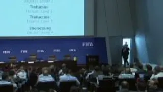 Audience member throws money at Sepp Blatter