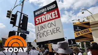 Writers Guild, Hollywood studios reach tentative deal to end strike