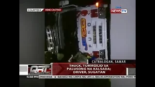 QRT: Truck, tumagilid sa palusong na kalsada