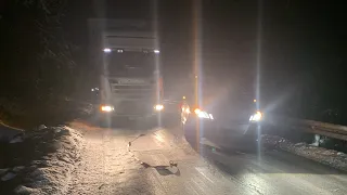 Volvo XC60 pulling truck up icy hill. Volvo AWD power. DDrive