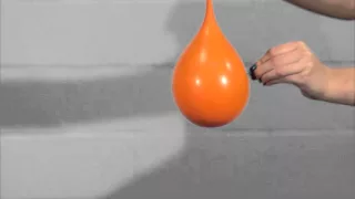 Popping a water balloon in slow motion!