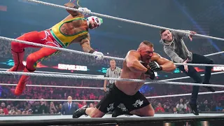 Rey mysterio and Dominic attack Brock lesnar