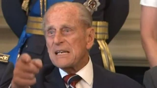 Prince Philip swears at photographer