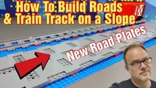 How to make a sloped road with the new lego road plates and lego train track.