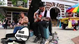 Chris Rodrigues and Abby the Spoon Lady Busking in Asheville, NC