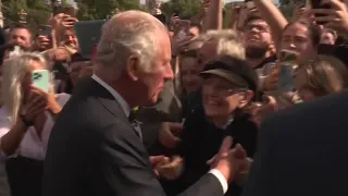 King Charles greets crowds at Buckingham Palace