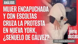 VIDEOS ¬ Mujer encapuchada y con escoltas cruza la protesta NY. ¿Señuelo de Gálvez?