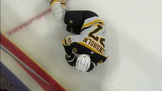 Canes Andrei Svechnikov absolutely destroys Bruins Lindholm with a massive hit.