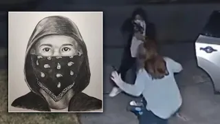 'Don't hurt my kid!': Woman robbed by gunman while taking baby out of car in driveway, video shows