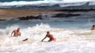 Exhausted Man Saved From Rip Currents By Lifeguards in Hawaii.