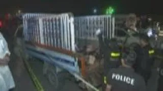 Police: Attackers target truck in Karachi, kill 9
