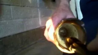 Cute kitten gets stuck in tiny pipe