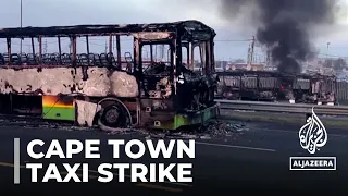 South African police battle looters after days of taxi driver protests